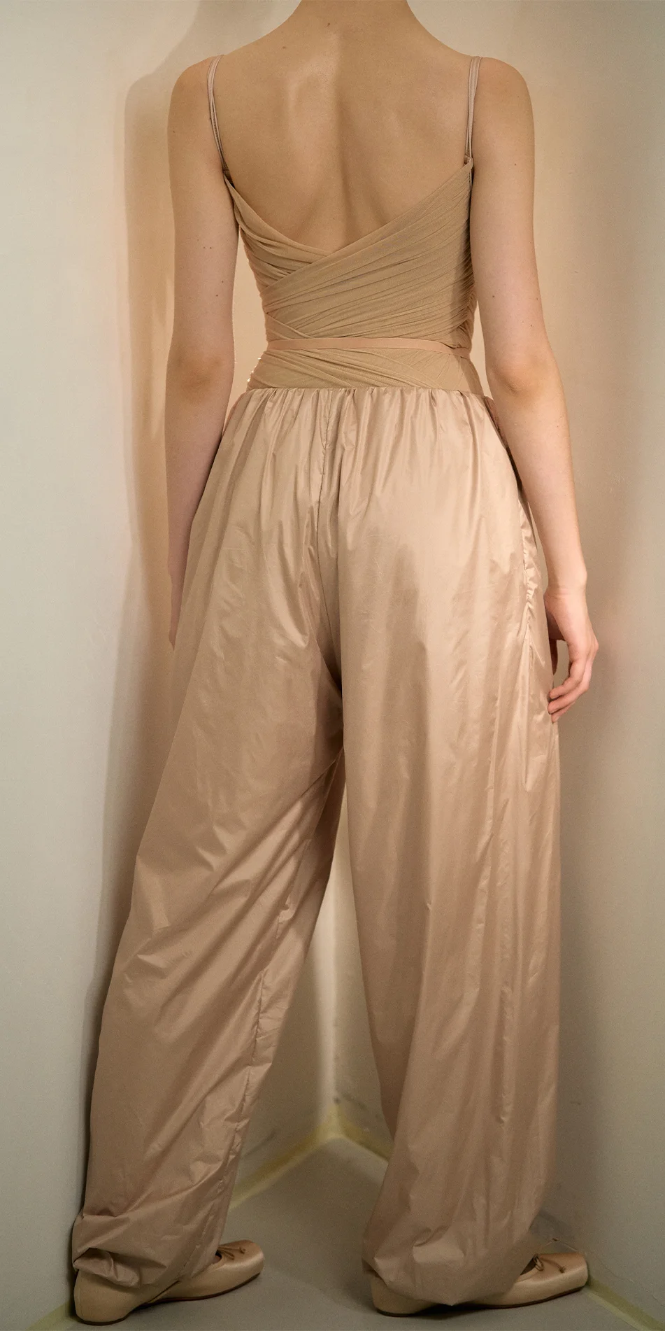 Womens lightweight baggy pants in light beige back crop shot