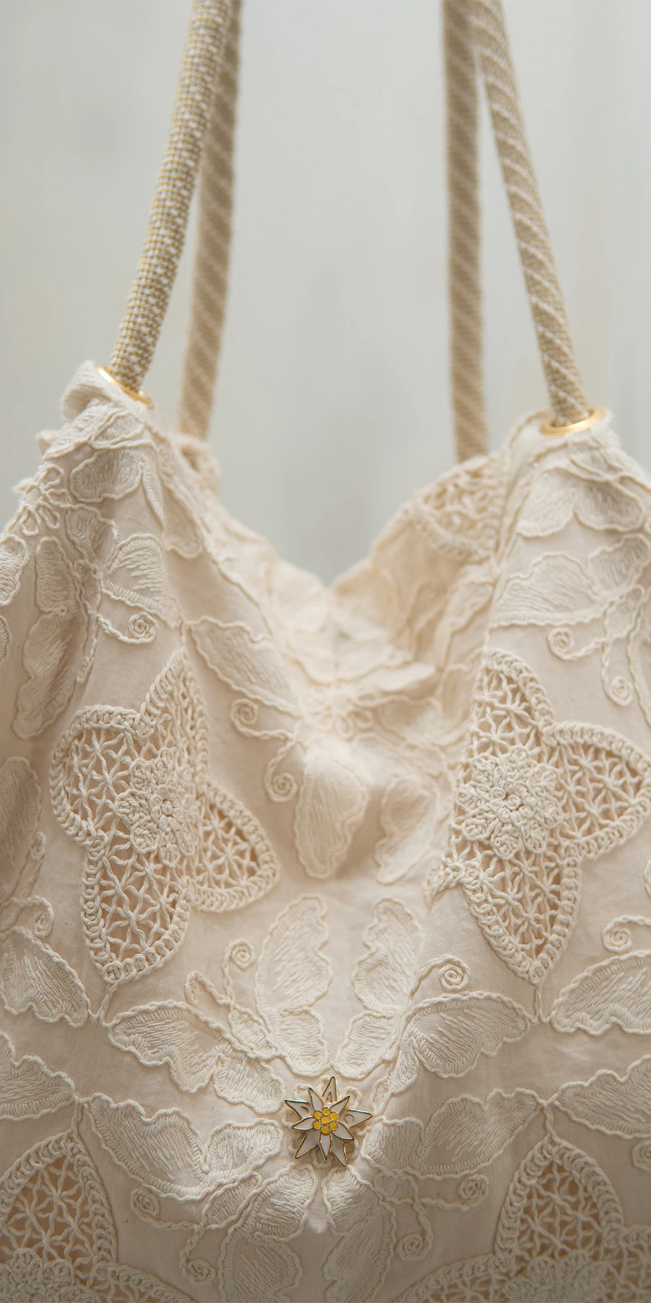 Embroidered cotton tote in cream close up