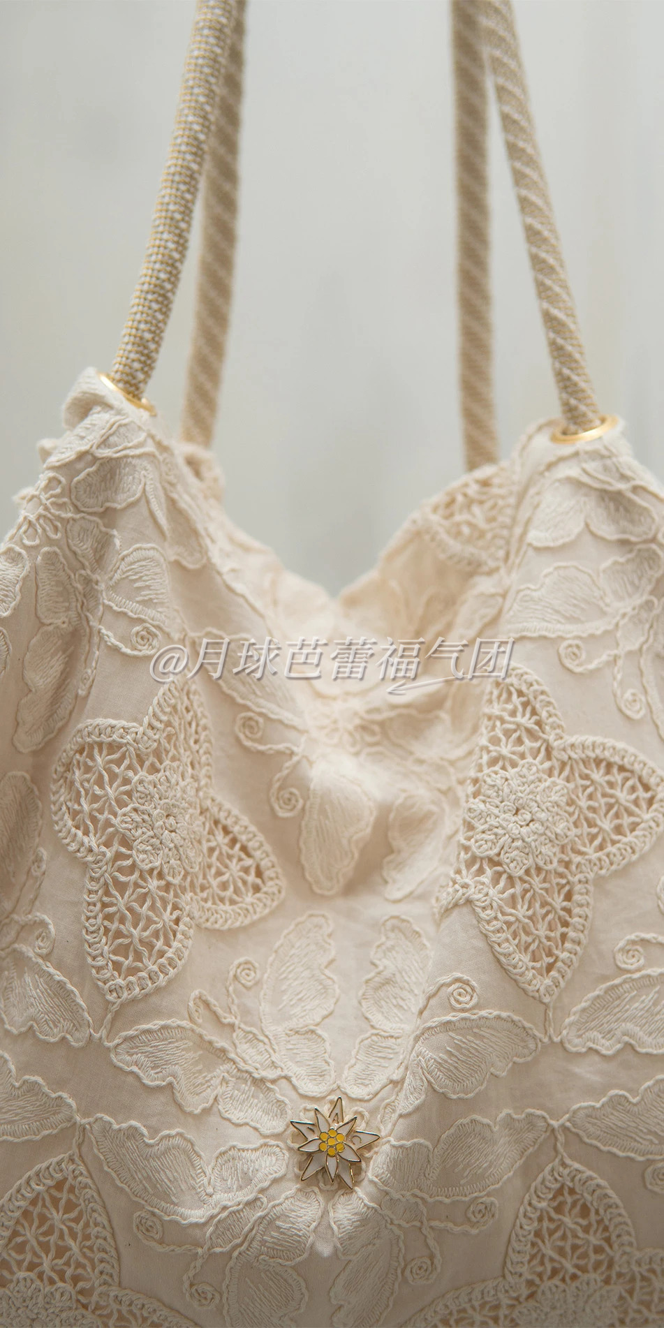 Embroidered cotton tote in cream close up