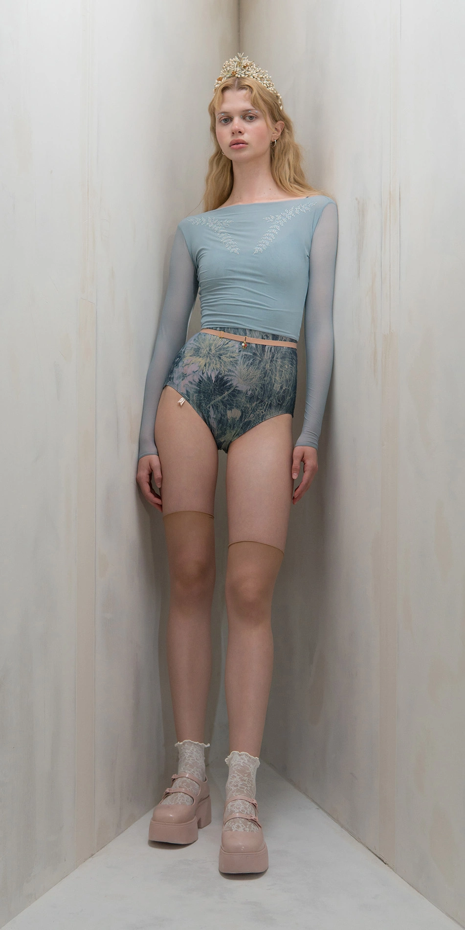 Sheer crop top with rhinestuds in light blue full body front