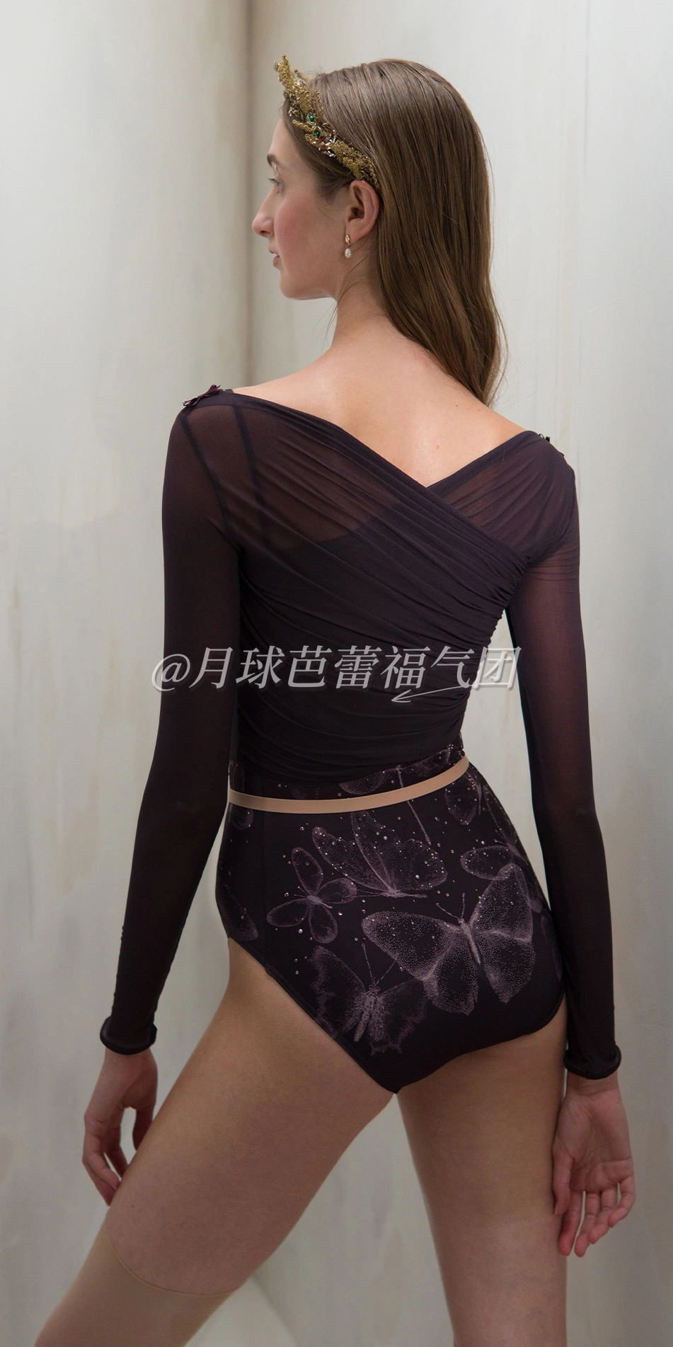 Sheer wrap croptop in dark purple back cropped looking left