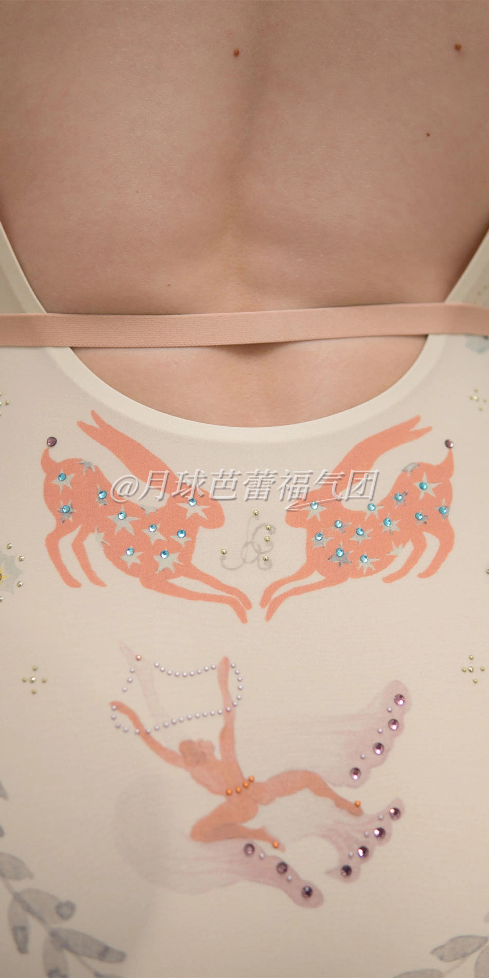 Printed boatneck leotard with rhinestones in cream back cropped looking over shoulder