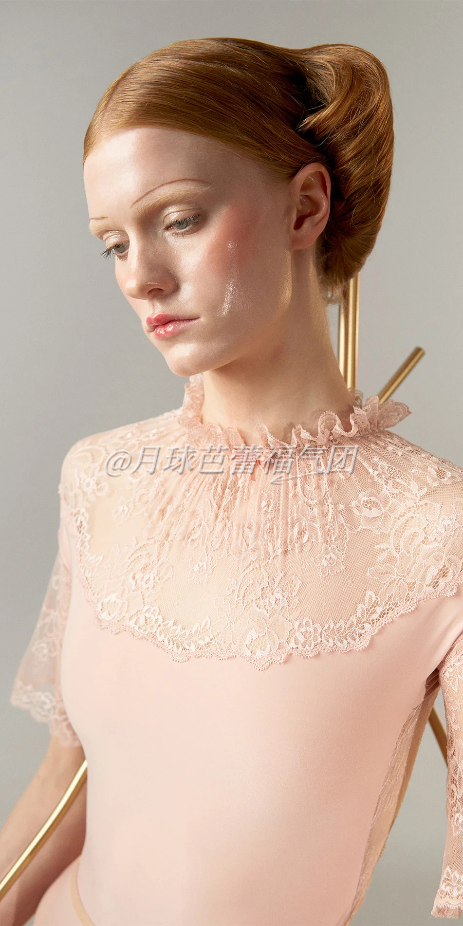 03_Mockneck-leotard-with-bell-sleeves-in-baby-pink-cropped-front-view-side-look.webp
