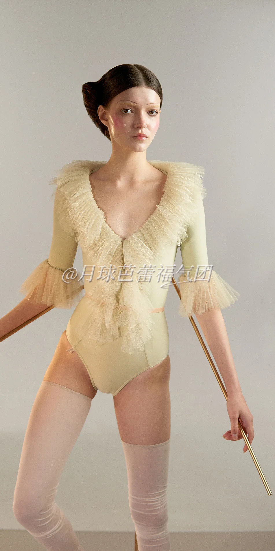 04_Tulle-decollete-leotard-with-sleeves-green-tea-cropped-front-view.webp